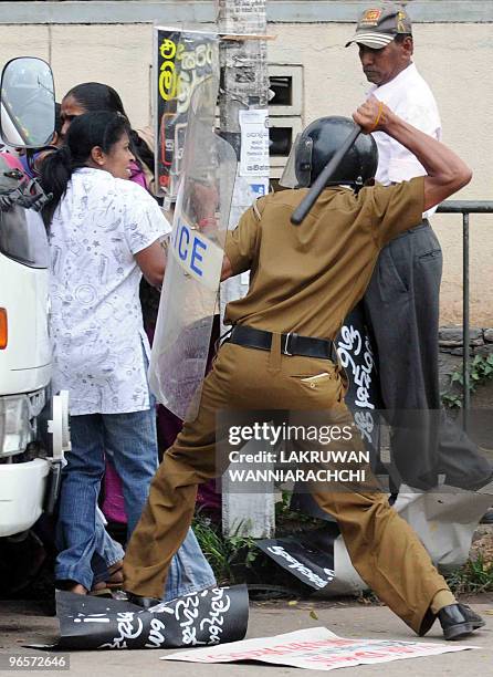 Sri Lanka police baton charge opposition protestors in the eastern Colombo suburb of Maharagama on February 11, 2010. Sri Lankan police used batons...