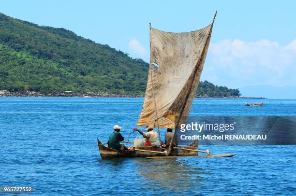Madagascar, Outrigger canoe around Nosy Be in the north of the island.