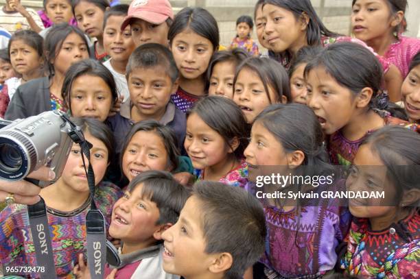 Children from a school near Panajachel at Lake Atitlan surrounded by volcanoes. Guatemala.