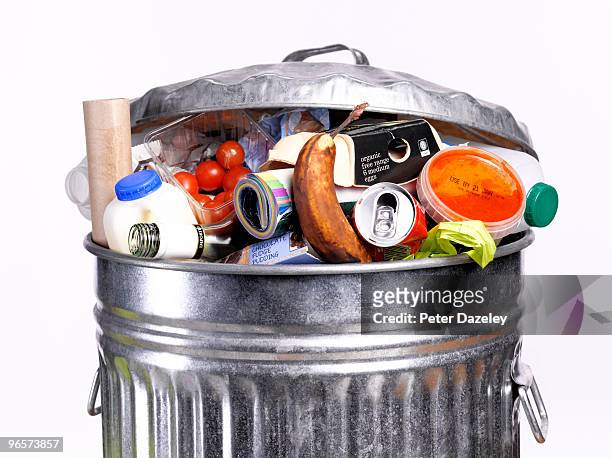 out of date rotting food in dustbin - food and drink stock pictures, royalty-free photos & images