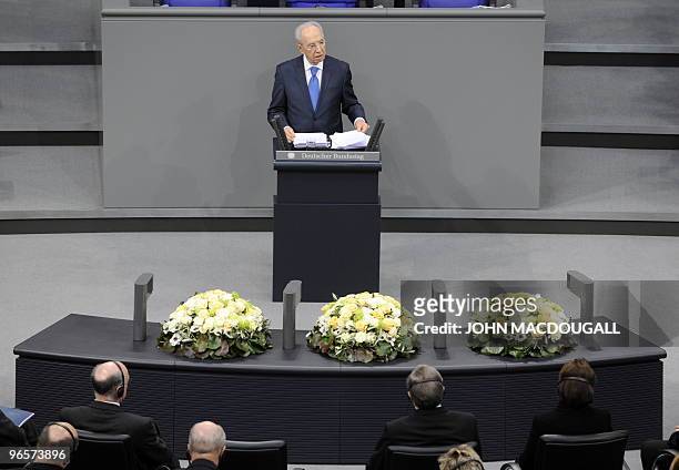 Israeli President Shimon Peres addresses the Bundestag lower house of parliament on the occasion of International Holocaust Remembrance Day, in...