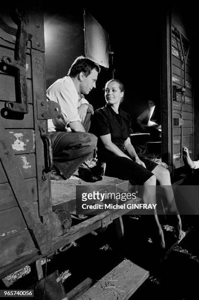 Austrian-born actress Romy Schneider and French actor Jean-Louis Trintignant on the set of the movie 'Le Train', directed by Pierre Granier-Deferre,...