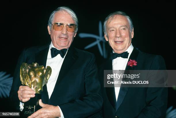 Gregory Peck And Yves Montand At Cannes Film Festival, May 23, 1989.