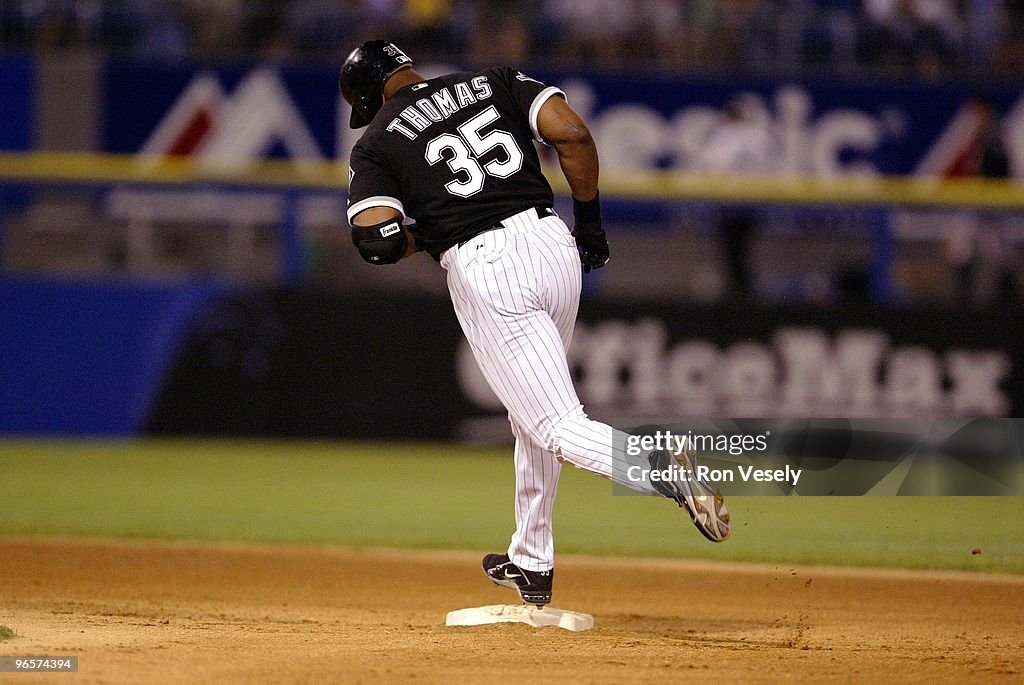 Devil Rays Frank Frank Thomas of Chicago White Sox rounds the bases after hitting his ...