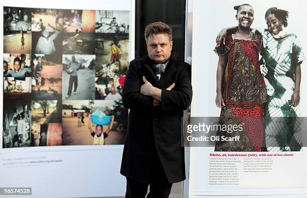 Portrait photographer Rankin poses outside the National Theatre with an exhibition of images he took on a recent visit to the Democratic Republic of...