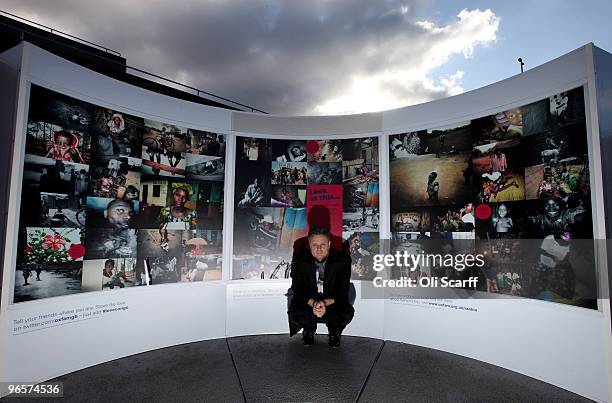 Portrait photographer Rankin poses outside the National Theatre with an exhibition of images he took on a recent visit to the Democratic Republic of...