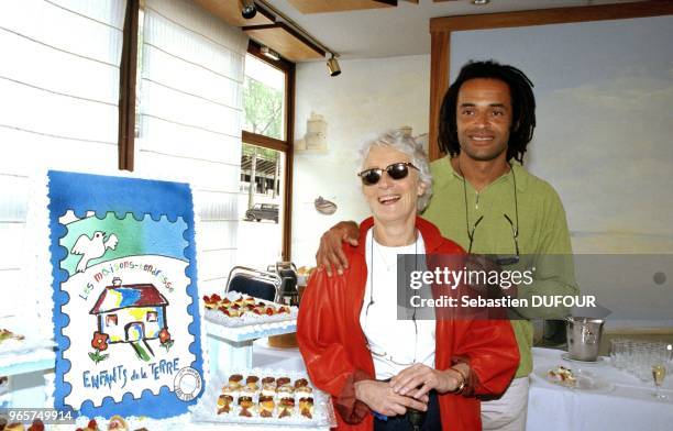 Yannick Noah and mother Marie Claire Noah at press conference for 5th Tennis Concert, on April 23, 1998 in France.