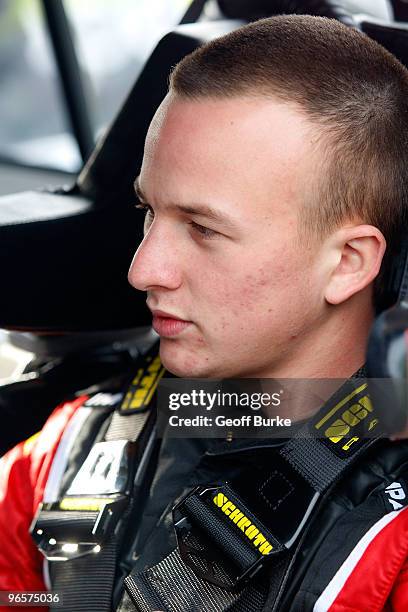 Tayler Malsam, driver of One Eighty Toyota, sits in his car during practice for the NASCAR Camping World Truck Series NextEra Energy Resources 250 at...