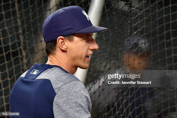 Manager Craig Counsell of the Milwaukee Brewers looks on during batting practice for the MLB game against the Arizona Diamondbacks at Chase Field on...