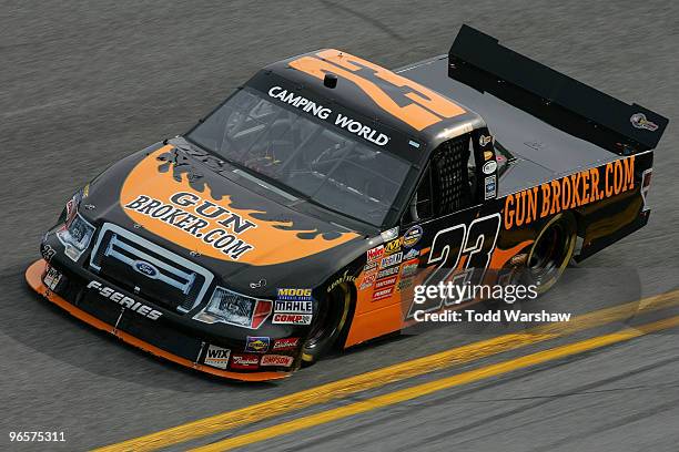 Jason White drives the GunBroker.com Ford during practice for the NASCAR Camping World Truck Series NextEra Energy Resources 250 at Daytona...