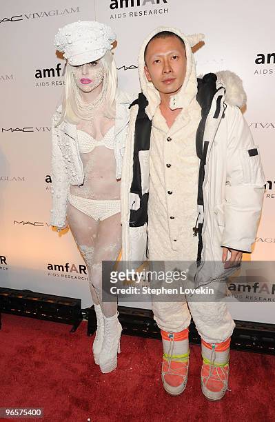 Musician Lady Gaga and artist Terence Koh attend the amfAR New York Gala co-sponsored by M.A.C Cosmetics at Cipriani 42nd Street on February 10, 2010...