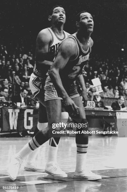 All-time basketball great Elgin Baylor of the visiting Los Angeles Lakers boxes out Chicago's Bob Boozer, during a game in Chicago, 1967.