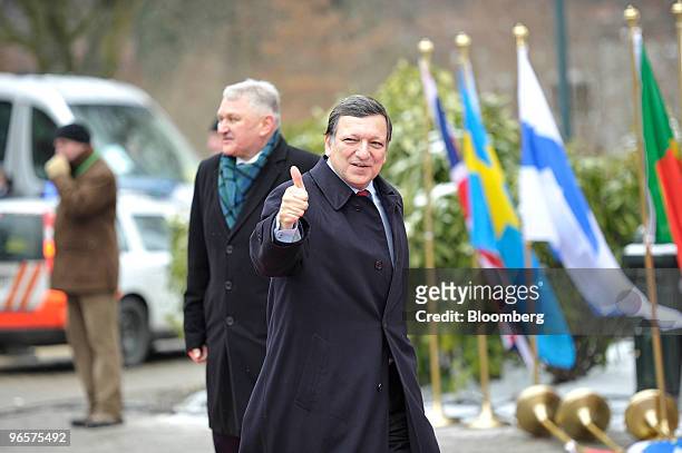Jose Manuel Barroso, president of the European Commission, center, arrives for the European Union Summit in Brussels, Belgium, on Thursday, Feb. 11,...