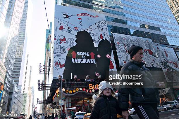 Target Corp. Advertisement featuring a sillouette of snowboarder Shaun White hangs in Times Square, in New York, U.S., on Thursday, Feb. 11, 2010....