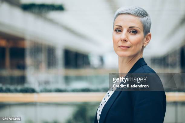 portrait of a businesswoman - eastern european woman stock pictures, royalty-free photos & images