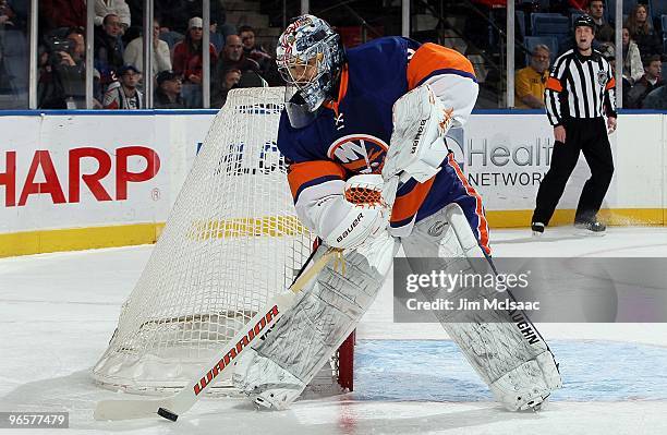 Rick DiPietro of the New York Islanders skates against the Carolina Hurricanes on February 6, 2010 at Nassau Coliseum in Uniondale, New York.