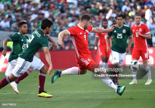 Sam Vokes of Wales in action against Mexico during the first half of their friendly international soccer match at the Rose Bowl on May 28, 2018 in...