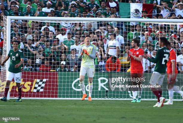 Goalkeeper Wayne Hennessey of Wales cheers after making a save against Mexico during the first half of their friendly international soccer match at...