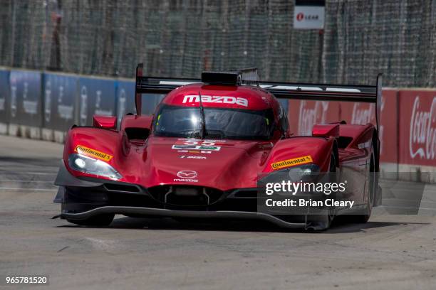The Mazda DPi of Jonathan Bomarito and Harry Tincknell of Great Britain races on the track during practice for the IMSA WeatherTech Series sportscar...