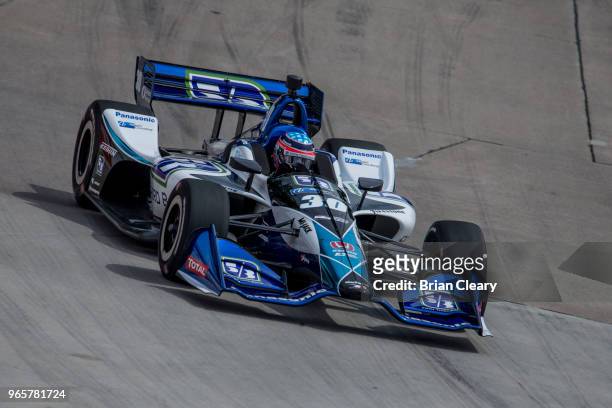 Takuma Sato of Japan drives the Honda Indy car on the track during practice for the Verizon IndyCar series race at the Chevrolet Detroit Grand Prix...