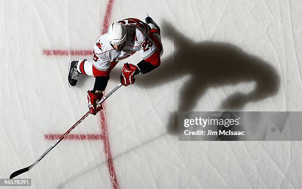 Tom Kostopoulos of the Carolina Hurricanes warms up before playing the New York Islanders on February 6, 2010 at Nassau Coliseum in Uniondale, New...
