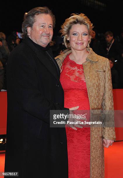 Eve Maren Buechner and husband Helmut Sendelmeier arrive to the 'Tuan Yuan' Premiere during day one of the 60th Berlin International Film Festival at...