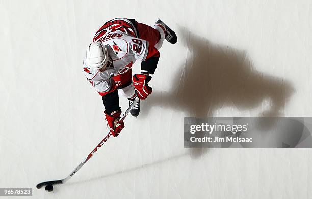 Tom Kostopoulos of the Carolina Hurricanes warms up before playing the New York Islanders on February 6, 2010 at Nassau Coliseum in Uniondale, New...