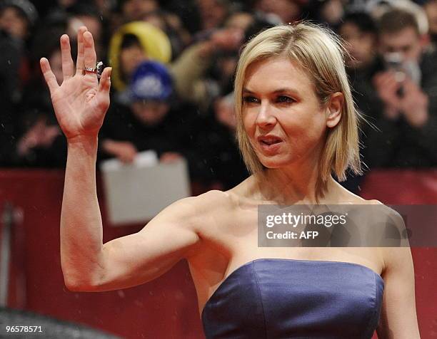 Actress Renee Zellweger and jury member waves as she arrives for the premiere of the film "Apart Together" competing in the 60th Berlinale Film...