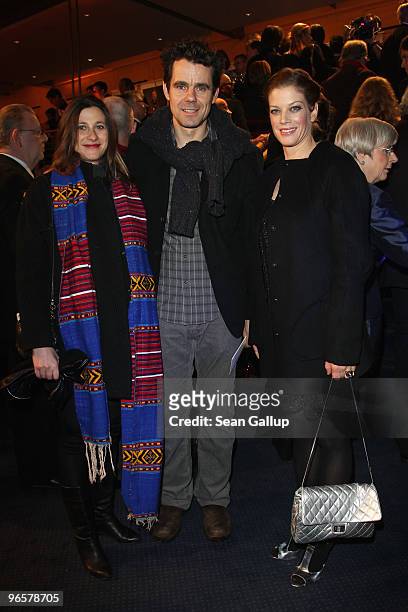 Director Tom Tykwer and his girlfriend Marie Steinmann arrive with actress Marie Baeumer the 'Tuan Yuan' Premiere during day one of the 60th Berlin...