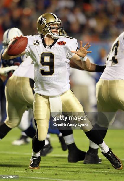 Quarterback Drew Brees of the New Orleans Saints looks to pass against the Indianapolis Colts during Super Bowl XLIV on February 7, 2010 at Sun Life...