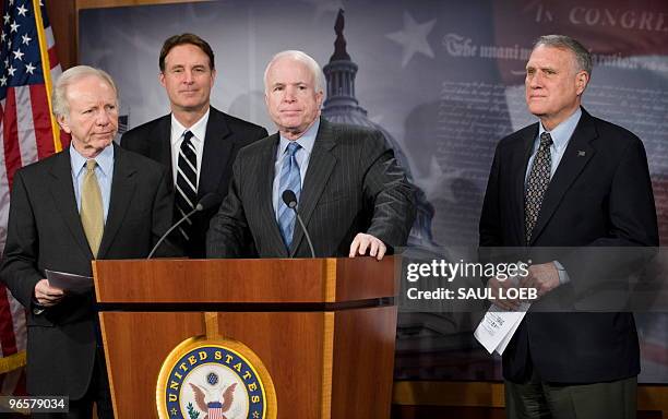 Republican Senator John McCain of Arizona speaks alongside fellow US Senators Republican Jon Kyl of Arizona, Independent Joe Lieberman of Connecticut...