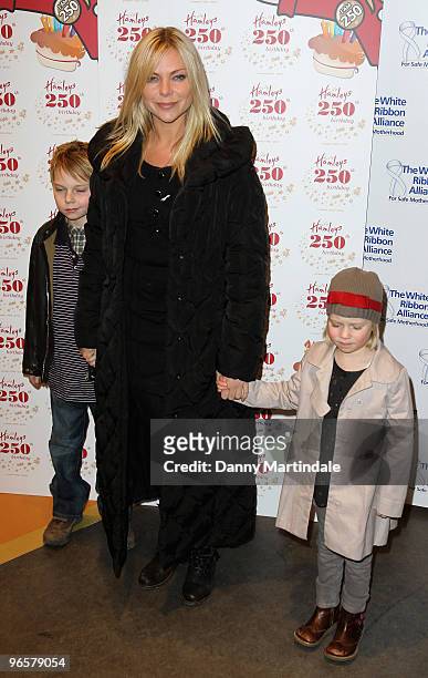 Samantha Janus and children attend the 250th Birthday Party of Hamleys at Hamleys on February 11, 2010 in London, England.