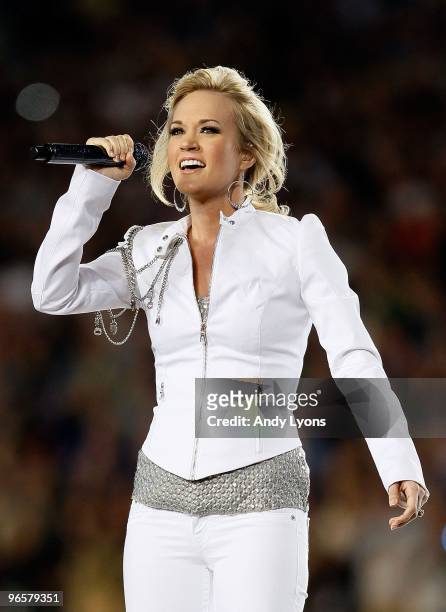 Singer Carrie Underwood performs during the pregame show prior to Super Bowl XLIV between the Indianapolis Colts and the New Orleans Saints on...