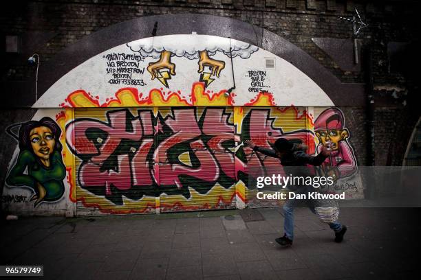 Girl runs to greet her friend in Brixton Market on February 11, 2010 in London, United Kingdom. As the UK gears up for one of the most hotly...