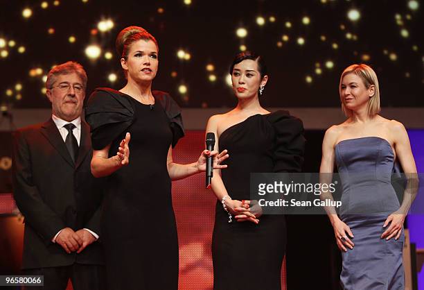 Presenter Anke Engelke and jury members Jose Maria Morales , Yu Nan and Rene Zellweger attend the Opening Ceremony of the 60th Berlin International...