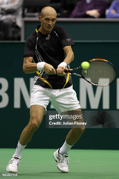 Nikolay Davydenko of Russia in action in his match against Marcus Baghdatis of Cyprus during day four of the ABN AMBRO World Tennis Tournament on...