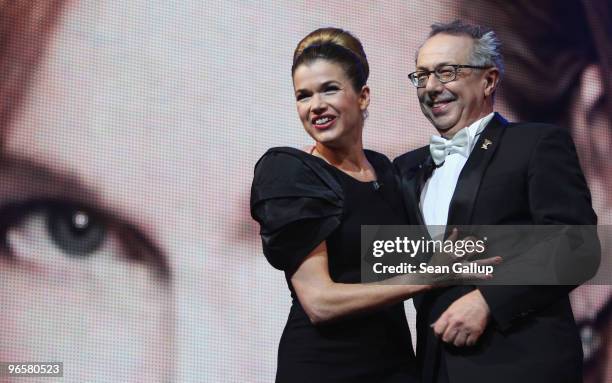 Presenter Anke Engelke and Festival director Dieter Kosslick attend the Opening Ceremony of the 60th Berlin International Film Festival at the...