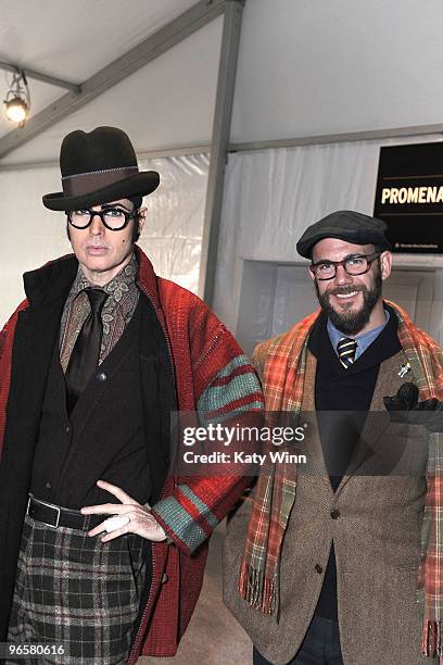 Patrick McDonald and writer Cator Sparks attend Mercedes-Benz Fashion Week at Bryant Park on February 11, 2010 in New York City.