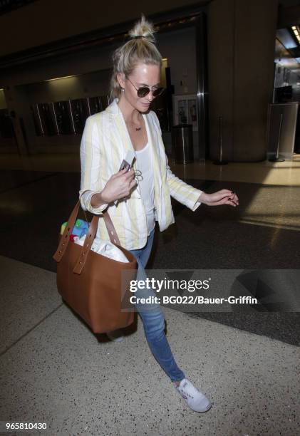 Poppy Delevingne is seen at LAX on May 31, 2018 in Los Angeles, California.