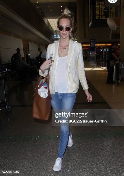 Poppy Delevingne is seen at LAX on May 31, 2018 in Los Angeles, California.