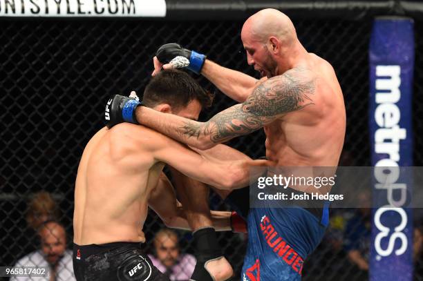 Ben Saunders lands a knee to the head of Jake Ellenberger in their welterweight fight during the UFC Fight Night event at the Adirondack Bank Center...