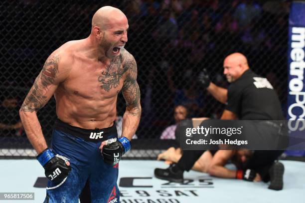 Ben Saunders reacts after finishing Jake Ellenberger in their welterweight fight during the UFC Fight Night event at the Adirondack Bank Center on...