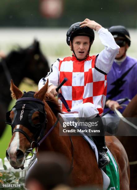 James McDonald on Radiant Choice returns to scale after winning race 4 during Sydney Racing at Rosehill Gardens on June 2, 2018 in Sydney, Australia.