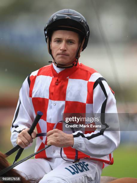 James McDonald on Radiant Choice returns to scale after winning race 4 during Sydney Racing at Rosehill Gardens on June 2, 2018 in Sydney, Australia.