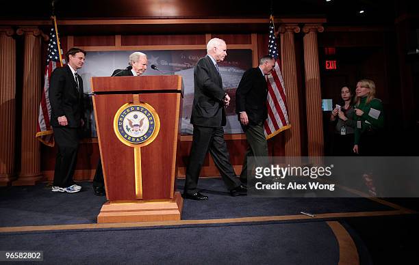 Sen. Evan Bayh , Sen. Joseph Lieberman , Sen. John McCain , and Sen. Jon Kyl leave after a news conference on Capitol Hill February 11, 2010 in...