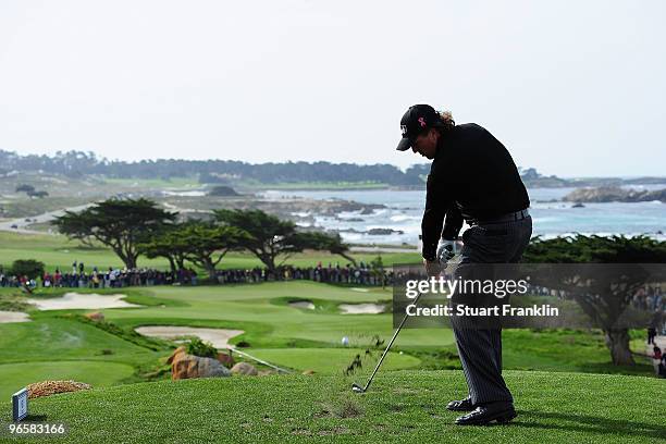 Phil Mickelson hits a tee shot on during round one of the AT&T Pebble Beach National Pro-Am at Monterey Peninsula Country Club Shore Course on...