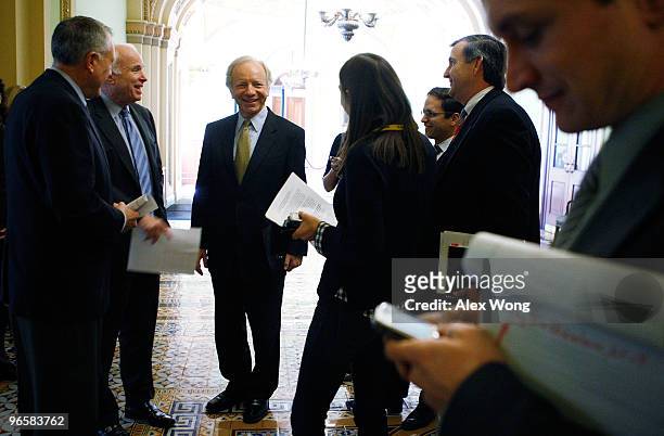 Sen. Jon Kyl , Sen. John McCain , and Sen. Joseph Lieberman meet up prior to a news conference on Capitol Hill February 11, 2010 in Washington, DC....