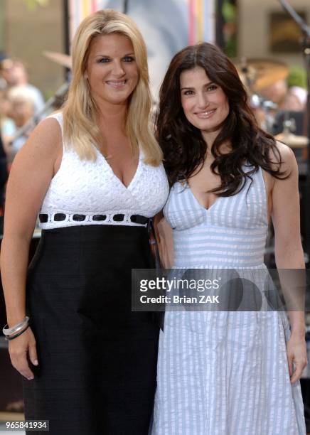 Trisha Yearwood and Idina Menzel perform as Katie Couric makes her final appearance on the NBC "Today" Show during a family and friends farewell...
