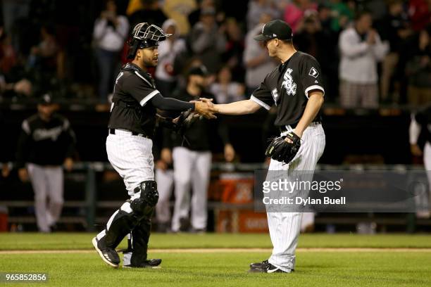 Omar Narvaez and Nate Jones of the Chicago White Sox celebrate after beating the Milwaukee Brewers 8-3 at Guaranteed Rate Field on June 1, 2018 in...