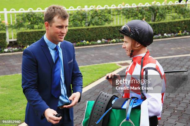 James McDonald talks to trainer Stirling Osland after winning race 4 on Radiant Choice during Sydney Racing at Rosehill Gardens on June 2, 2018 in...